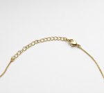 A65fddae 45a2 41d5 81f1 3a5ffd124789 Small Cubic Zirconia Gold Cross 3 4 X 1 2 19 Adjustable Box 2 1.jpg